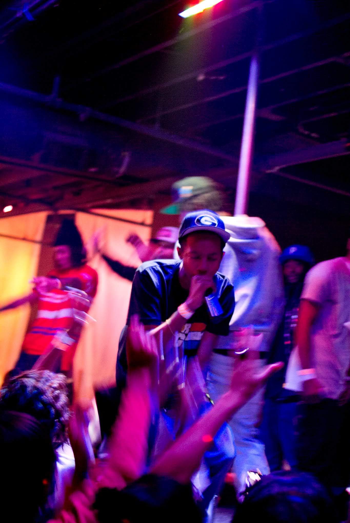 Davone performing on stage with the K.R.U.N.K. Movement