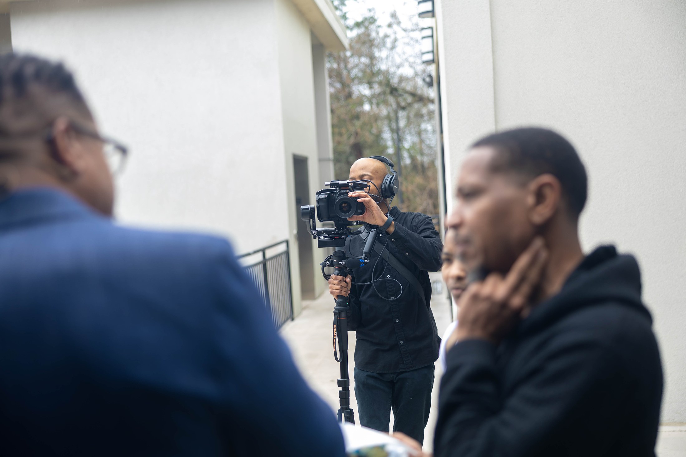 Davone filming an interview