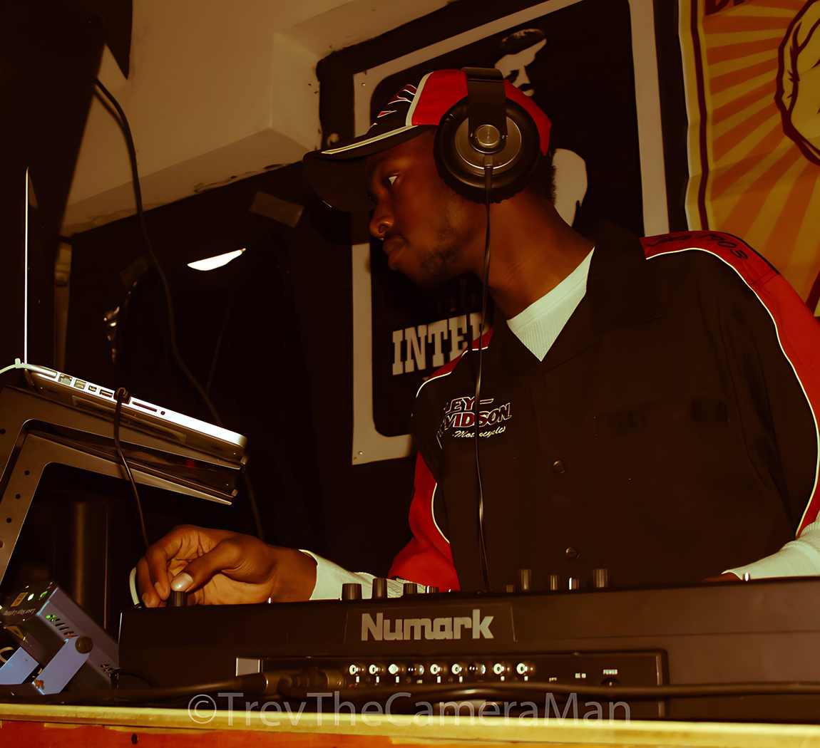 At the keyboard and mixer in the booth