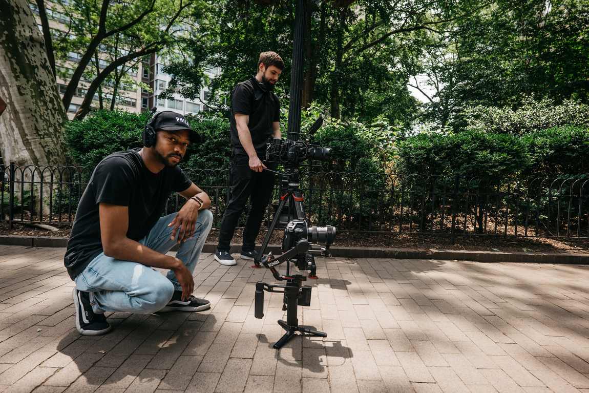 Davone setting up a gimbal shot in a Philadelphia park